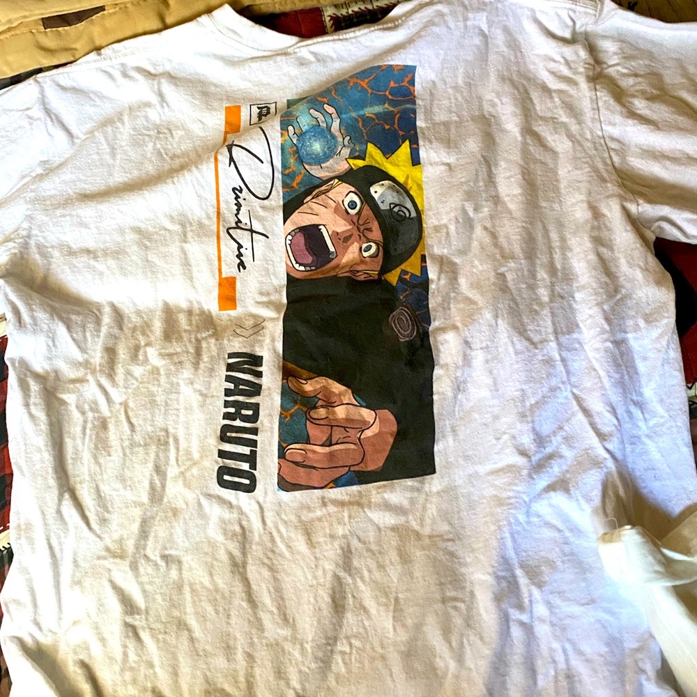 It is a white shirt with a signed primitive signature.